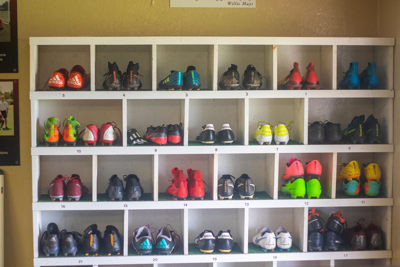 Wall of shoes in cubbies